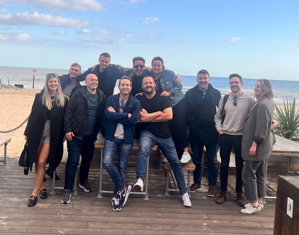 Content Ignite team on the boardwalk by the beach